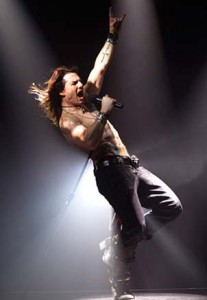 Tom Cruise tweets his inner rock-god, from "Rock of Ages" (photo: TomCruise.com / Storm Media)