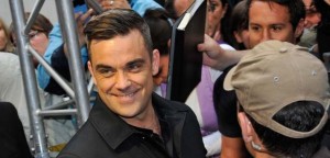 Robbie Williams at the movie premiere of "Cars 2" - photo: Splash